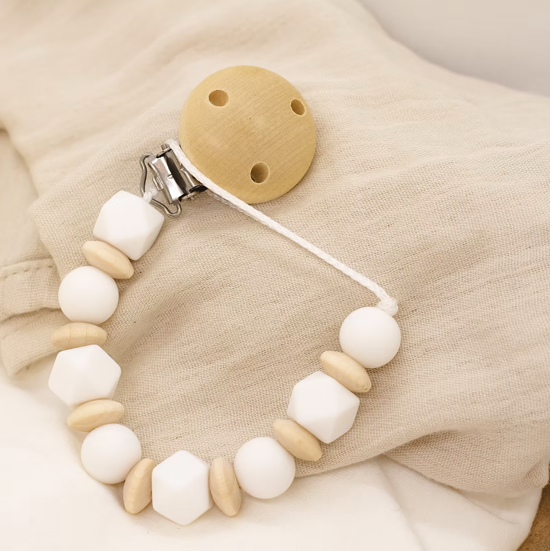 Attache tétine hexa rond